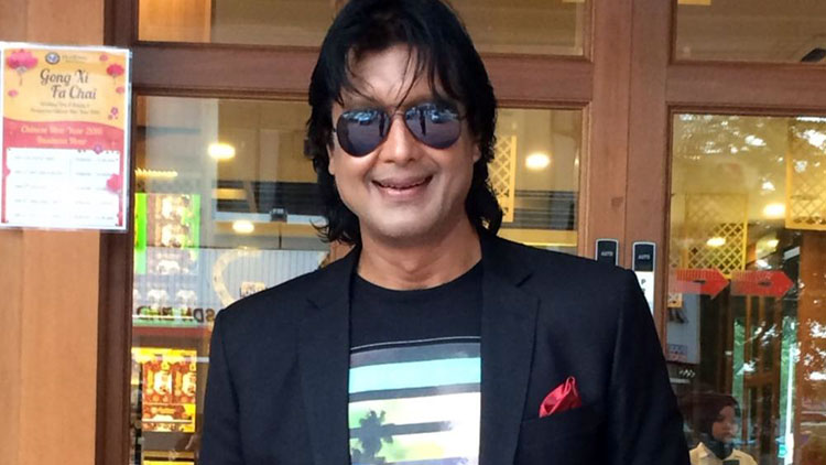 Rajesh-Hamal-Black-Coat