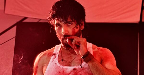 Nepali actor Sushil Shrestha in an intense action look from the movie Pariwartan, covered in sweat and blood during a dramatic scene.